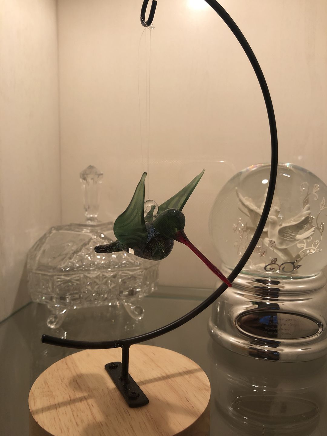 Customer photo review of Dichroic Twist Glass Hummingbird with Infused Ash