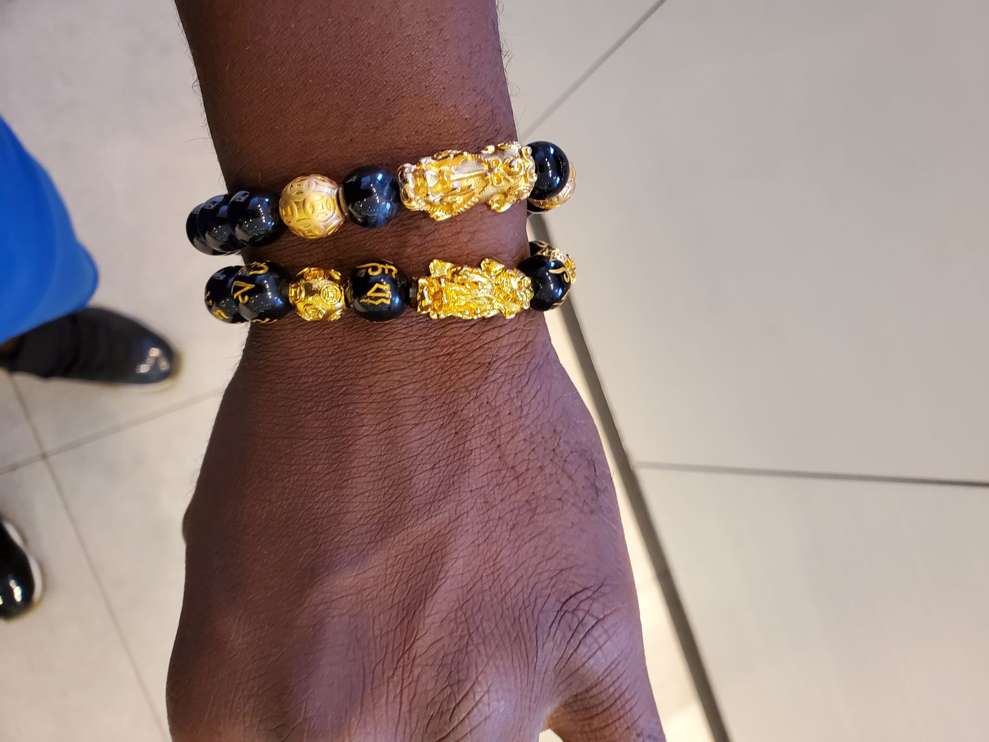 Customer photo review of Blue Tiger Eyes Wealth Mantra Feng Shui Pixiu Bracelet