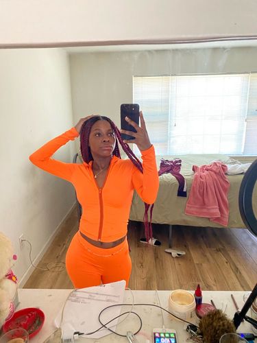 Customer photo review of Ensemble pantalon et gilet col haut avec fermeture