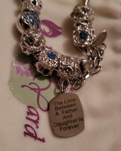 Customer photo review of Father Daughter Eternal Love Charm