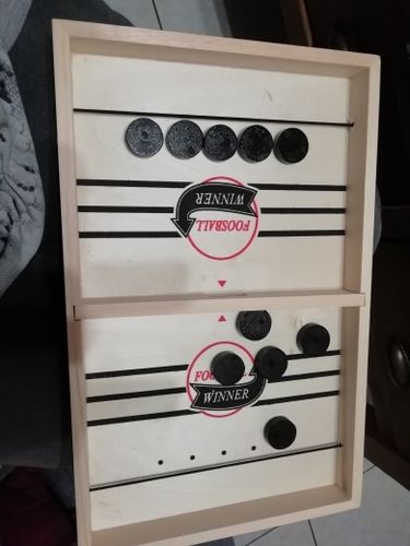 Customer photo review of Sling Puck - Fast Table Hockey Game