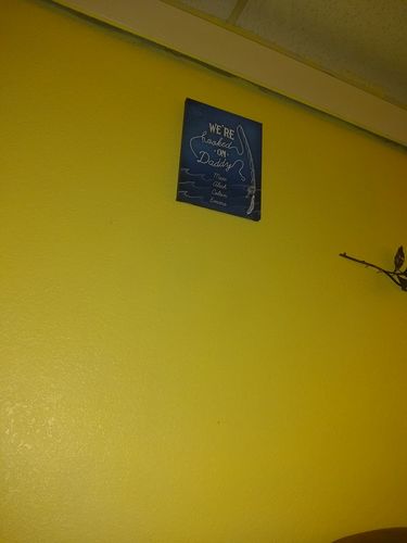 Customer photo review of We're Hooked On Daddy Personalized Premium Canvas