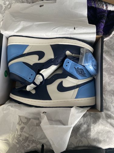 Customer photo review of Jordan 1 Retro High Obsidian UNC