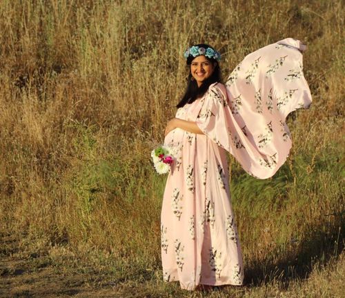 Customer photo review of Luxe Carnation Pink One Shoulder Floral Maternity Gown