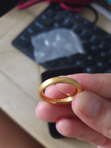 Customer photo review of Minimalist Sandblast Wedding Rings