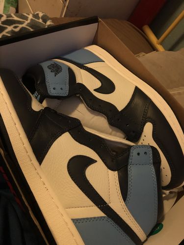 Customer photo review of Jordan 1 Retro High Obsidian UNC