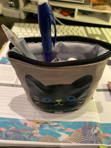 Customer photo review of CuteSchool ™ - Trousse scolaire se transformant en pot à crayon
