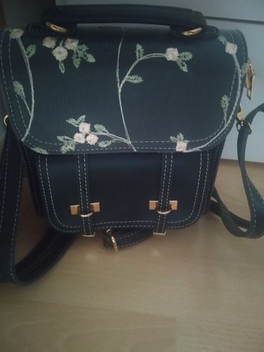 Customer photo review of Floral Embroidery Leather Backpack