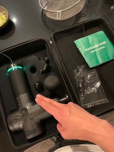 Customer photo review of LCD Display Touch Screen 20-Speed 4 Heads Massage Gun