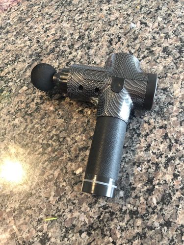 Customer photo review of LCD Display Touch Screen 20-Speed 4 Heads Massage Gun