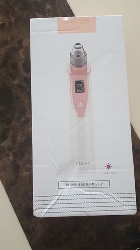 Customer photo review of Electric Blackhead Removing & Facial Pore Cleaning Vacuum Suction Tool -LED Display
