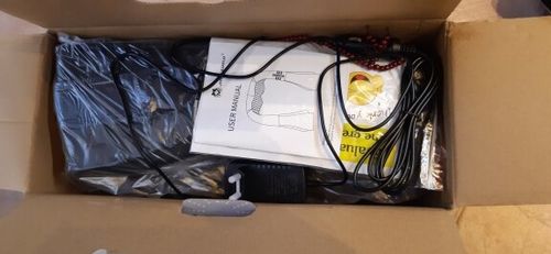 Customer photo review of Vibration Neck & Shoulder Massager With Heat and Velcro Design - Home Office Car Use