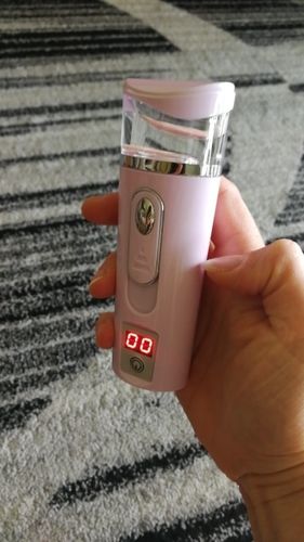 Customer photo review of 3-In-1 USB Portable Nano Facial Steamer Moisturizing Mist Sprayer with Power Bank