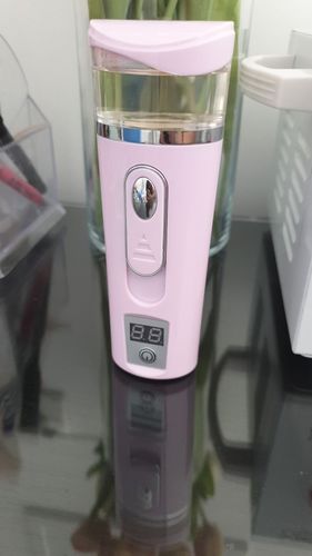 Customer photo review of 3-In-1 USB Portable Nano Facial Steamer Moisturizing Mist Sprayer with Power Bank