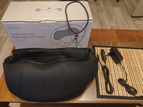 Customer photo review of Vibration Neck & Shoulder Massager With Heat and Velcro Design - Home Office Car Use