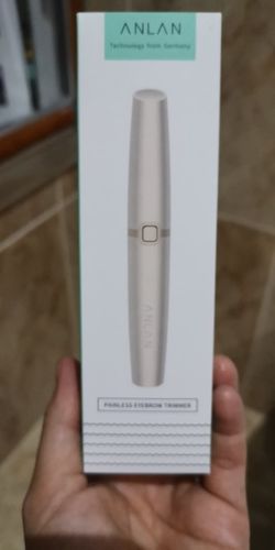 Customer photo review of Electric Portable Painless Eyebrow Trimmer - Facial Hair Remover Depilator
