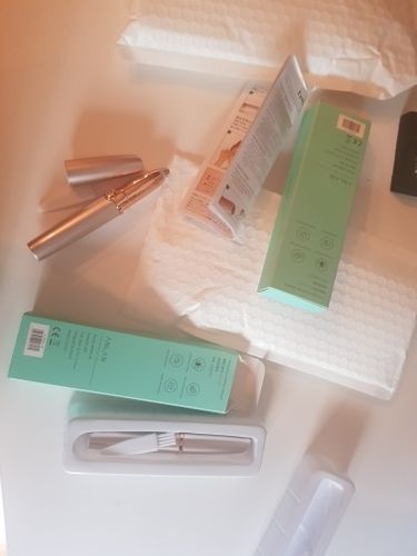 Customer photo review of Electric Portable Painless Eyebrow Trimmer - Facial Hair Remover Depilator