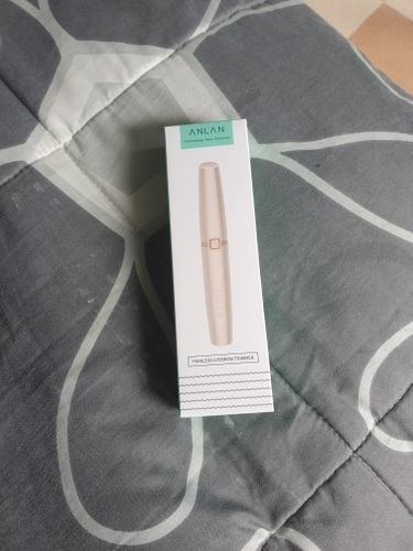 Customer photo review of Electric Portable Painless Eyebrow Trimmer - Facial Hair Remover Depilator