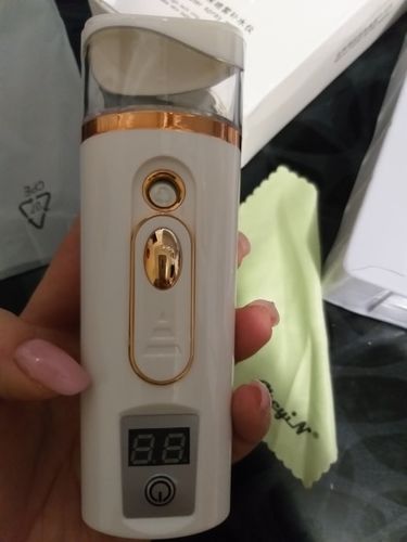 Customer photo review of 3-In-1 USB Portable Nano Facial Steamer Moisturizing Mist Sprayer with Power Bank