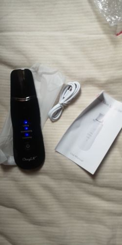 Customer photo review of Electric Ultrasonic Facial Skin Scrubber - Ionic Deep Face Cleaning