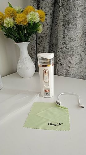 Customer photo review of 3-In-1 USB Portable Nano Facial Steamer Moisturizing Mist Sprayer with Power Bank