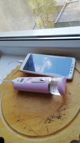 Customer photo review of 3-In-1 USB Portable Nano Facial Steamer Moisturizing Mist Sprayer with Power Bank
