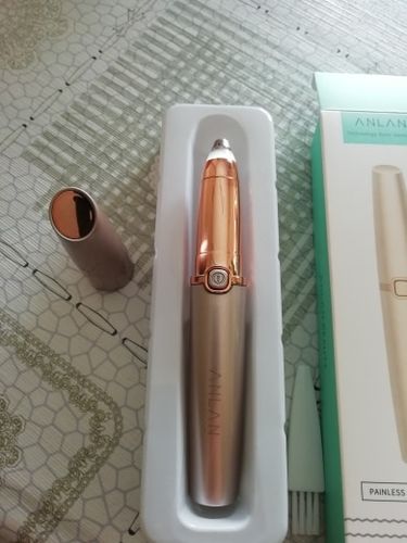 Customer photo review of Electric Portable Painless Eyebrow Trimmer - Facial Hair Remover Depilator