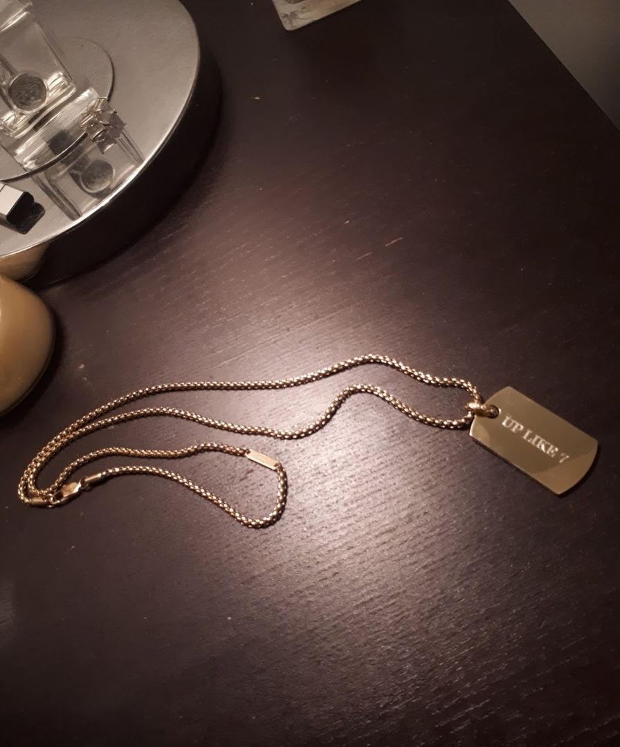 Customer photo review of Personalized Stainless Steel Engravable Dog Tag Pendant