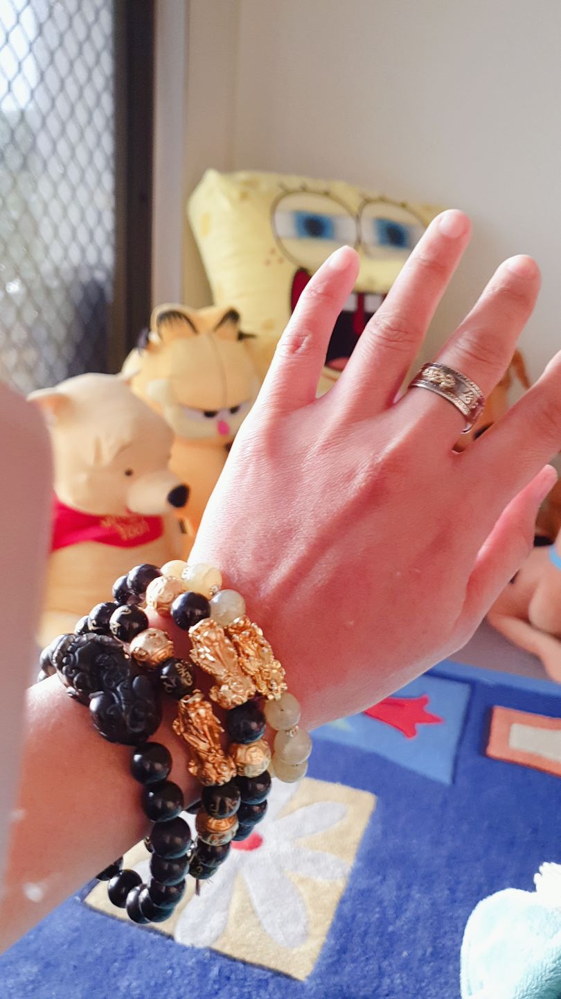 Customer photo review of Blue Tiger Eyes Wealth Mantra Feng Shui Pixiu Bracelet