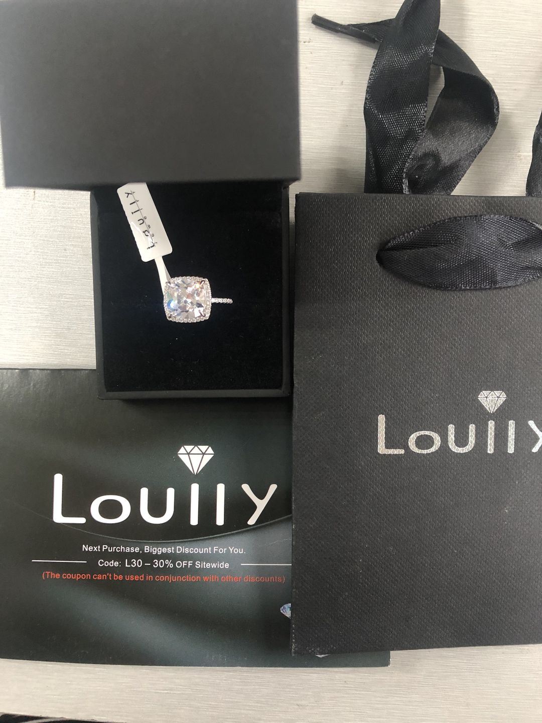 Customer photo review of Louily Halo Cushion Cut Engagement Ring In Sterling Silver