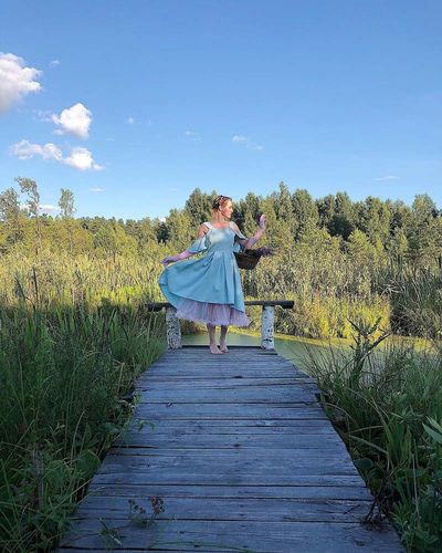 Customer photo review of Robe Vintage Année 50 Bleue Épaule Nue