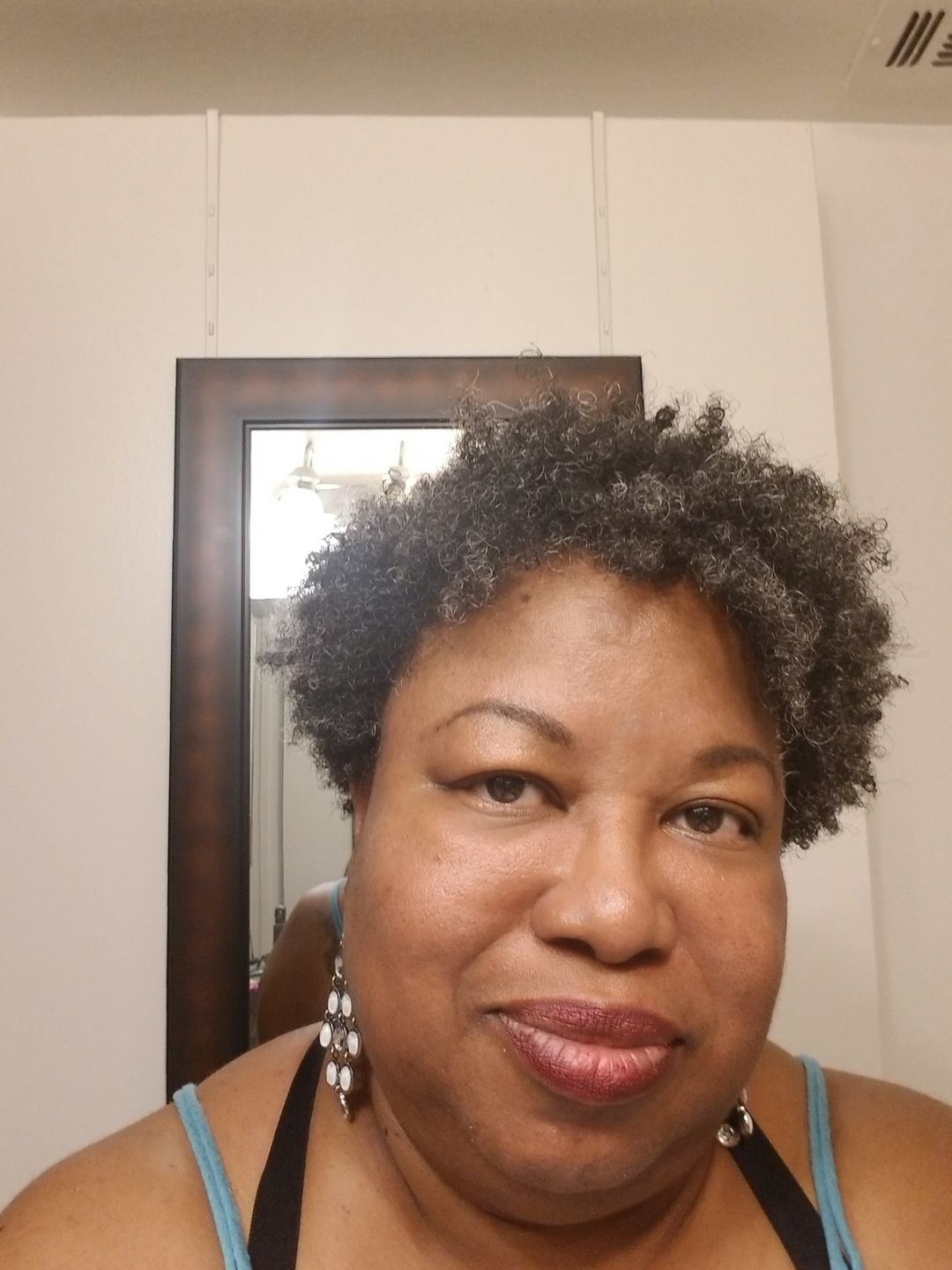Customer photo review of Hair Growth Serum for Curly Hair with Organic Jojoba Oil for Moisturizing and Lavender Fragrance
