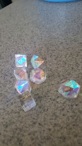 Customer photo review of URWizards Dnd Dichroic Prism Glass Dice Set YEET & F*CK
