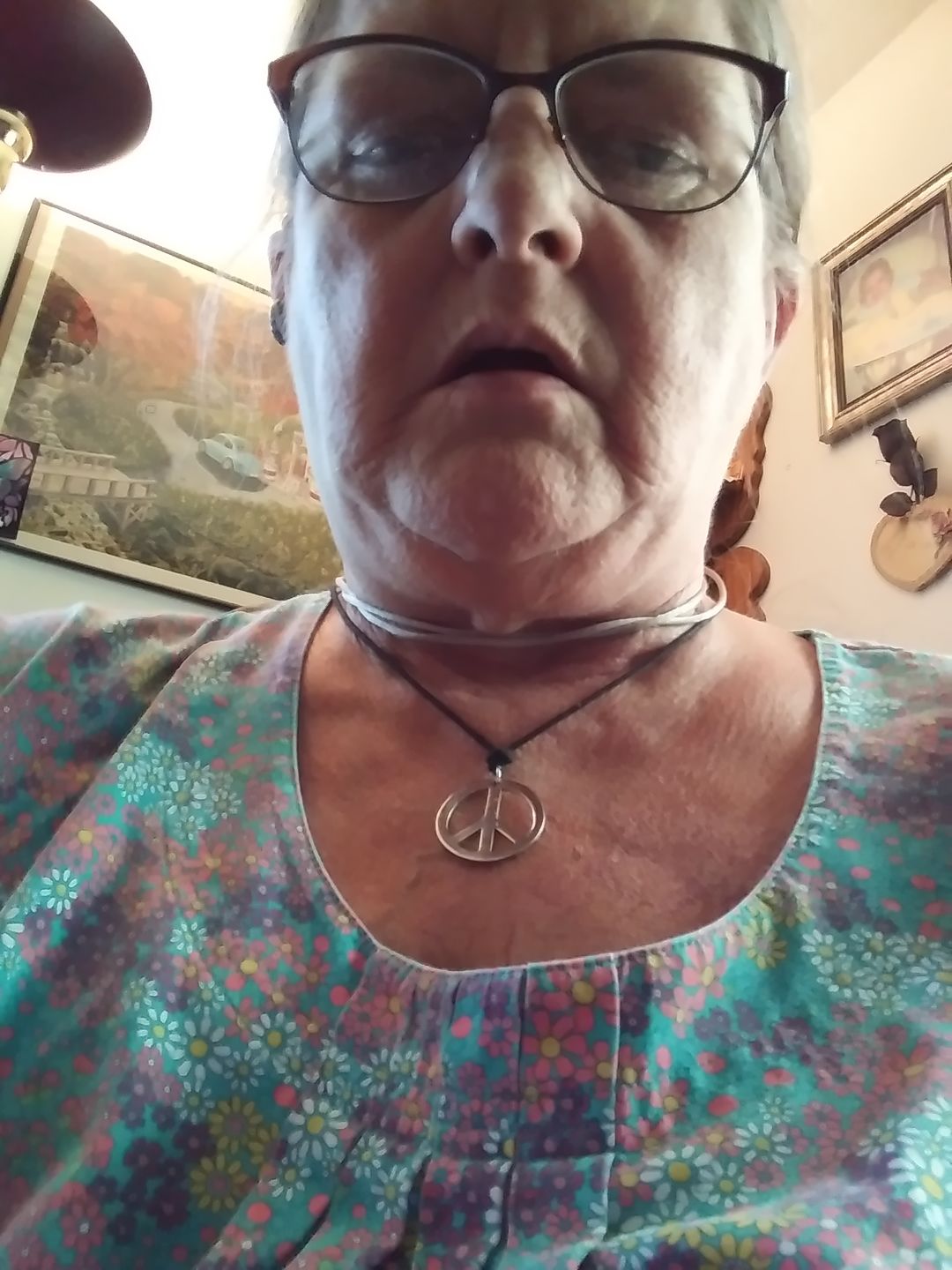 Customer photo review of Chrome Peace Necklace