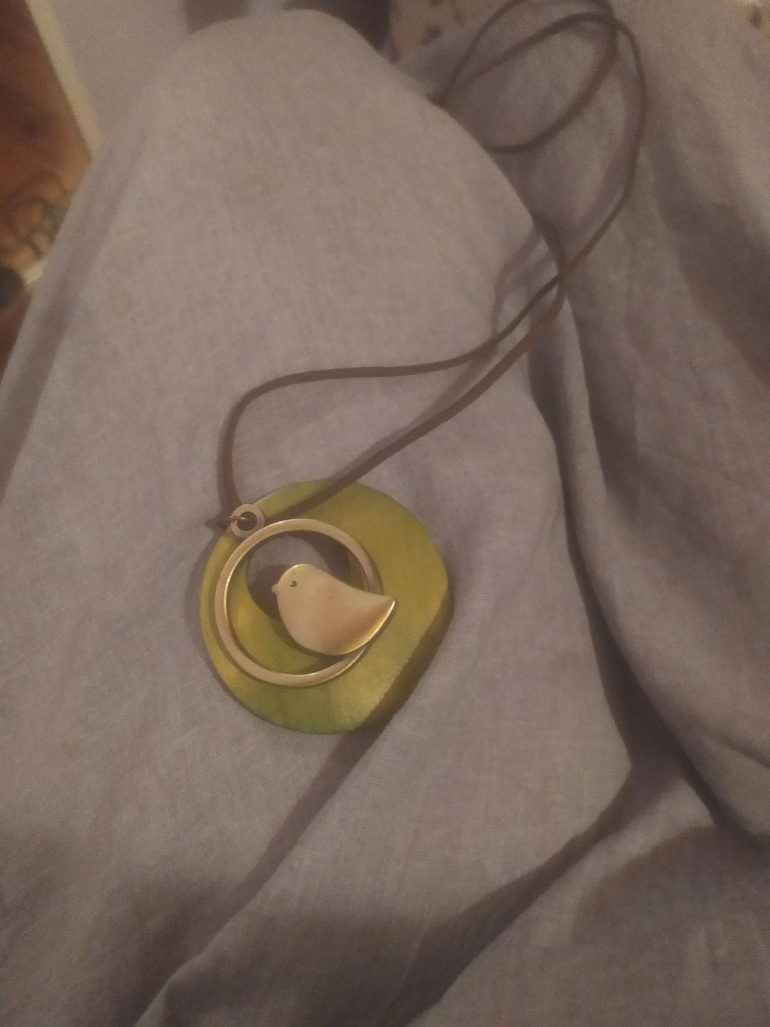Customer photo review of Cute Metal Bird Shape Round Wood Pendant Necklace