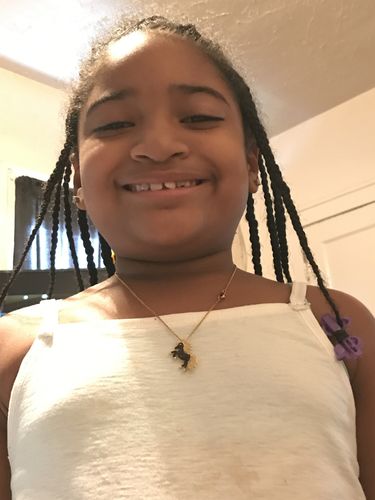 Customer photo review of Black Unicorn Necklace