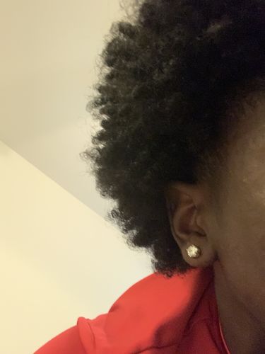 Customer photo review of VVS Moissanite Solitaire Stud Earrings