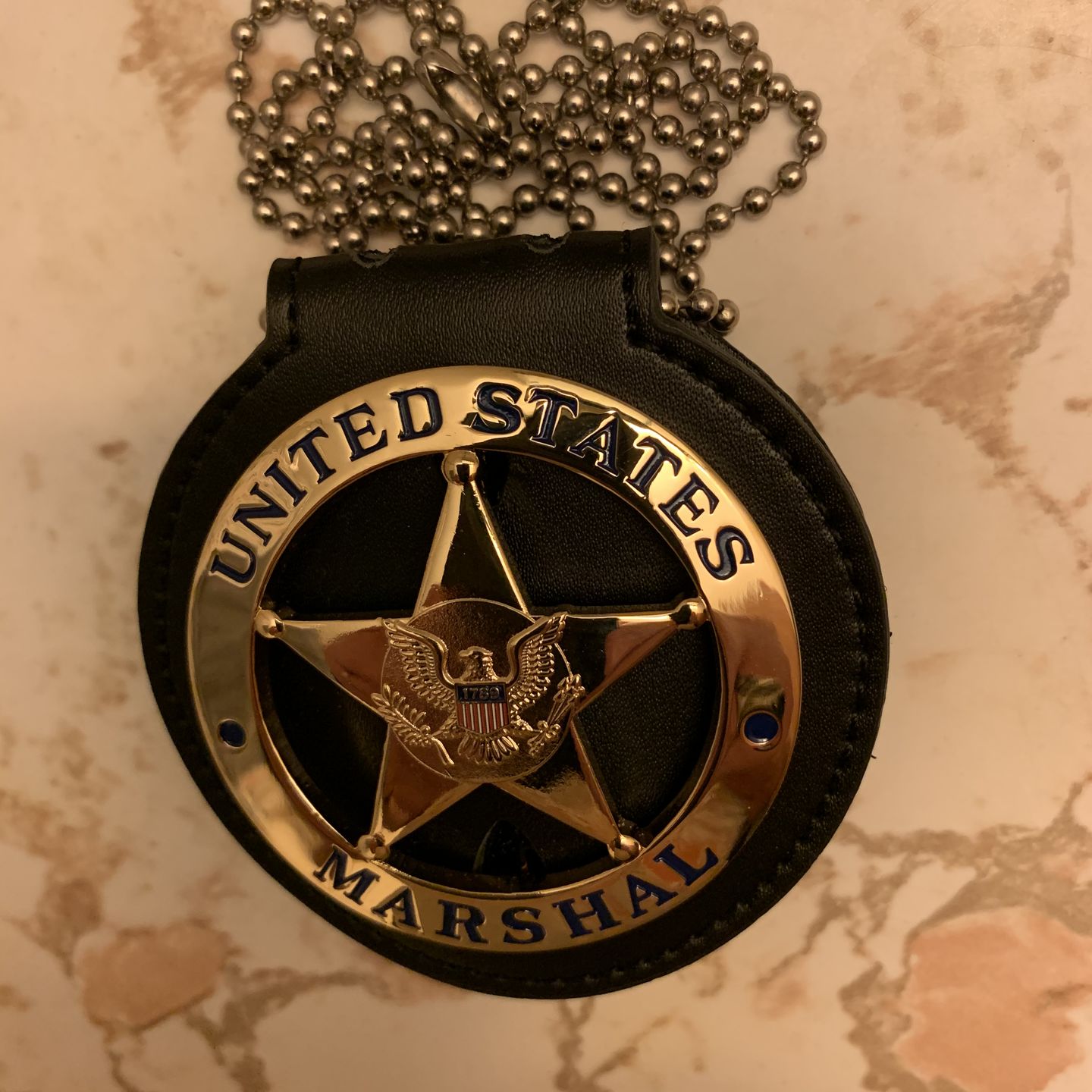 Customer photo review of US Federal Court Law Enforcement Marshal Gold Badge Replica Movie Props