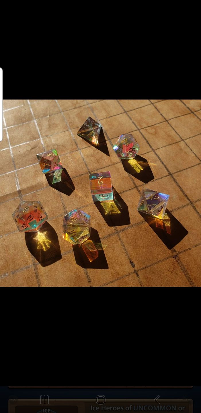 Customer photo review of URWizards Dnd Dichroic Prism Glass Gemstone Engraved Dice Set
