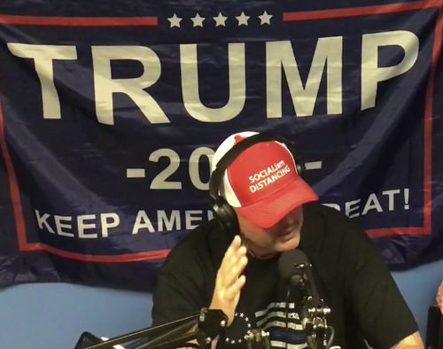 Customer photo review of Socialism Distancing Trucker Hat