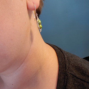 Customer photo review of Pea pod pearl earrings with green fresh water pearls