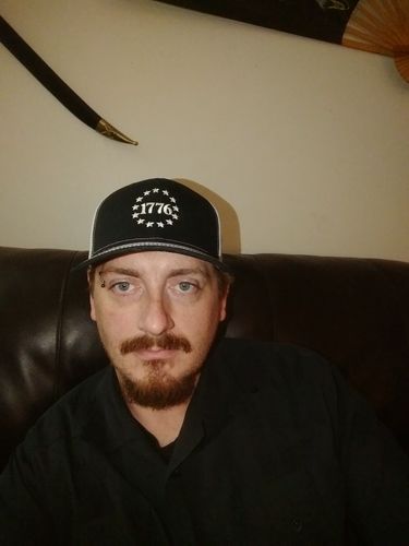 Customer photo review of 1776 Guns Trucker Hat