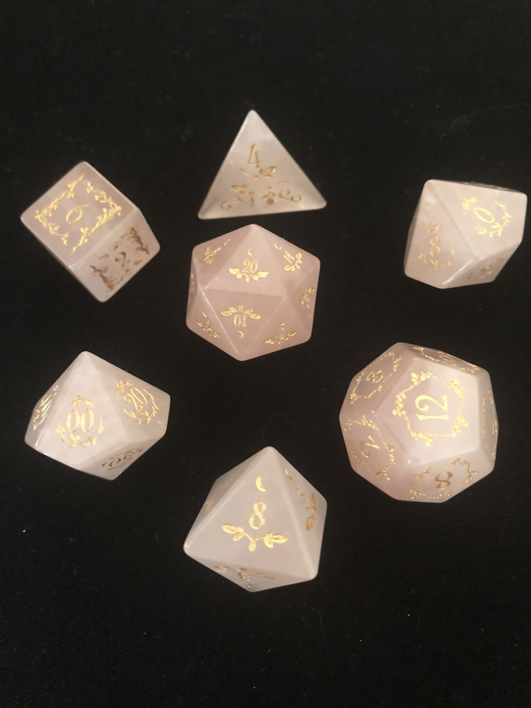 Customer photo review of URWizards Dnd Rose Quartz Gemstone Engraved Dice Set Plant Vine Style