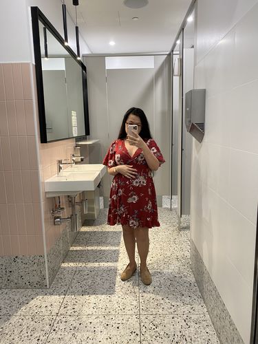 Customer photo review of Harlow Short Maternity Wrap Dress in Fiesta