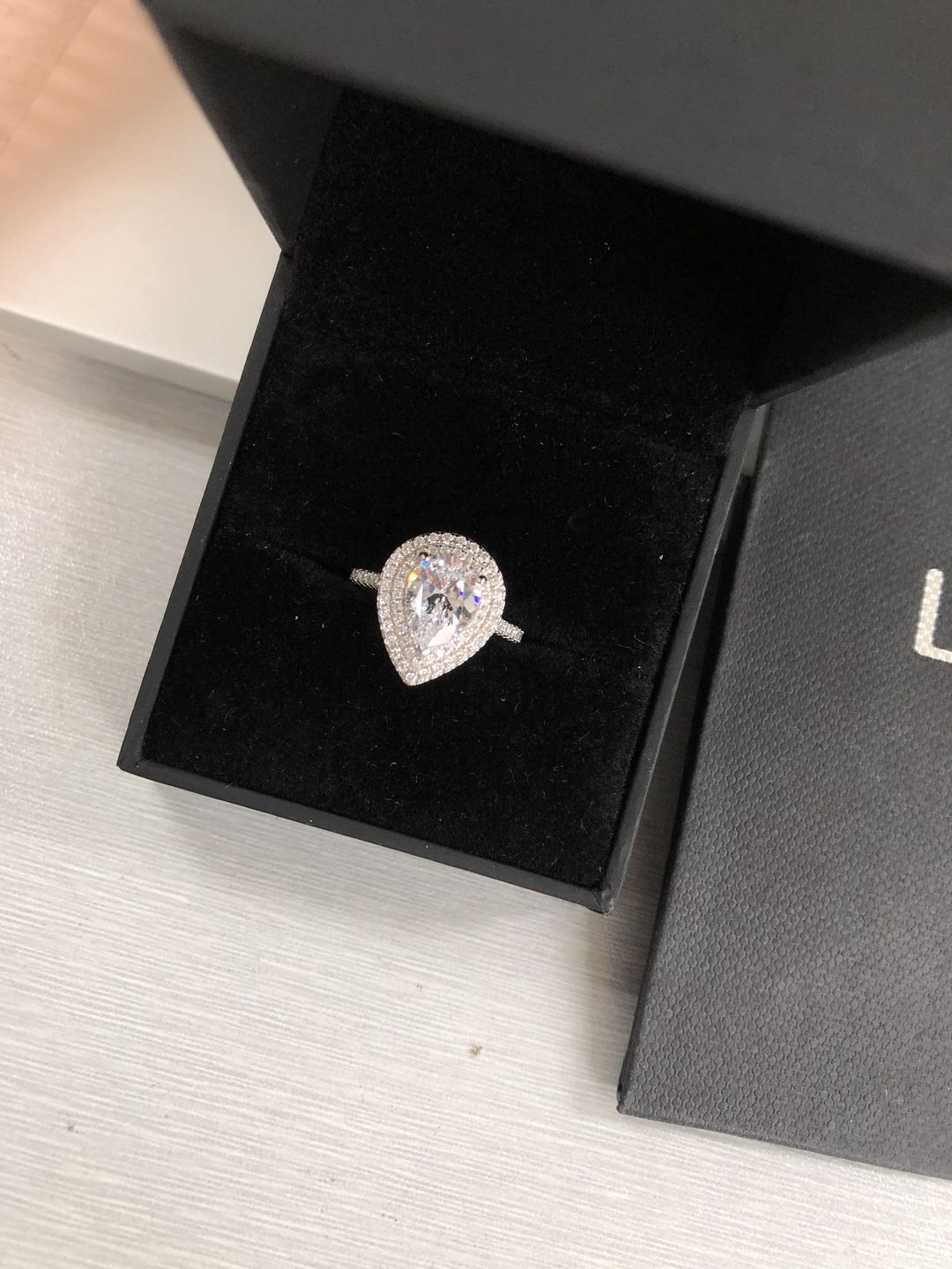 Customer photo review of Louily Double Halo Pear Cut Engagement Ring In Sterling Silver