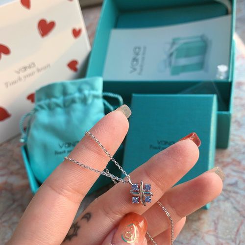 Customer photo review of Time And Space Lovers Sterling Silver Necklace