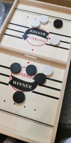 Customer photo review of Fast Sling Puck Board Game