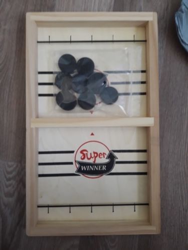 Customer photo review of Fast Sling Puck Board Game