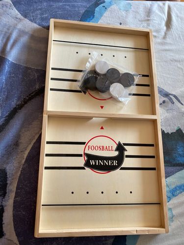 Customer photo review of Fast Sling Puck Board Game
