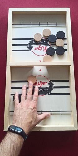 Customer photo review of Fast Sling Puck Board Game